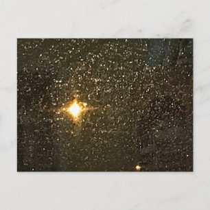 Bright Lights Night Sky through Raindrops Window Postcard