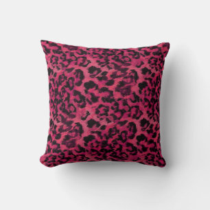Bright pink and black spotted leopard throw pillow