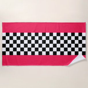 Bright pink and chequerboard beach towel