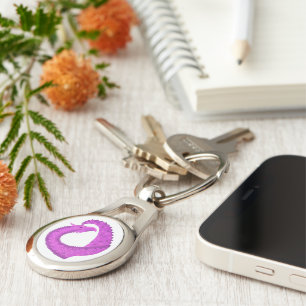 Bright purple heart dragon on white keychain