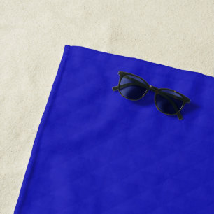 Bright Solid neon blue textured. Beach Towel