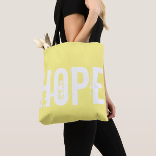 Bright sunny yellow with white Hope text Tote Bag