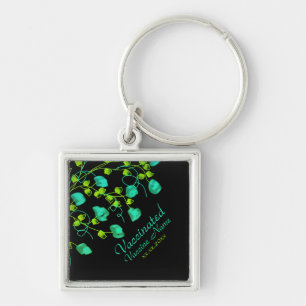 Bright teal and lime green floral keychain