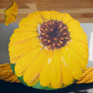 Bright yellow flower after rain round pillow