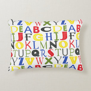 Brightly Coloured Letters by Megan Meagher Accent Pillow