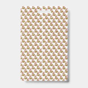 Brightly coloured wrapping paper with a festive pa badge