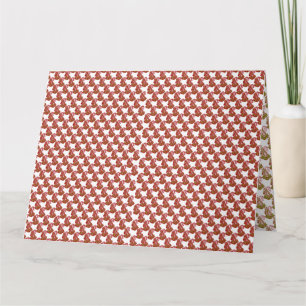 Brightly coloured wrapping paper with a festive pa card