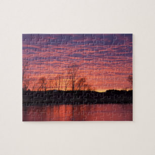 Brilliant sunset reflects into the Calamus River Jigsaw Puzzle