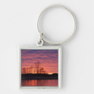 Brilliant sunset reflects into the Calamus River Keychain