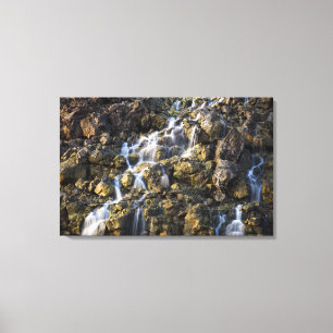 Brine falls from volcanic rock drop off 2 canvas print
