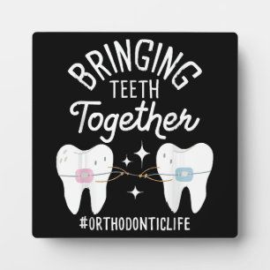 Bringing Teeth Together - Orthodontist  Plaque