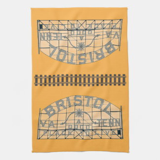 Bristol Slogan Sign with Tracks on Orange Kitchen Towel