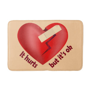Broken heart healed with patch and life quote bath mat