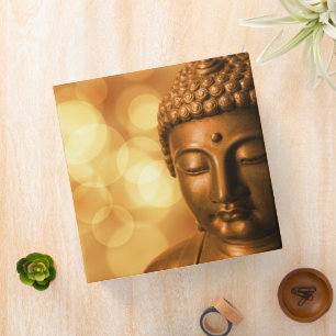 Bronze Buddha Statue with Golden Bokeh Background Binder