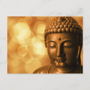 Bronze Buddha Statue with Golden Bokeh Background Postcard