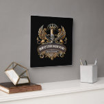 Brotherhood Cigar Company  Square Wall Clock<br><div class="desc">Keep time in style with the Brotherhood Cigar Company Square Wall Clock. Featuring the signature crest in gold and espresso tones, this clock embodies craftsmanship, precision, and masculine sophistication. Perfect for cigar lounges, offices, home bars, or studios, it adds a refined focal point to any wall. A distinguished gift for...</div>