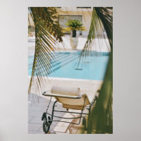 Brown and black armchair beside swimming pool in t