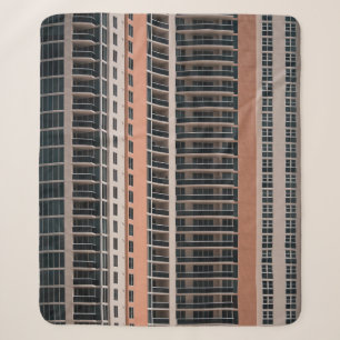 Brown and black high-rise building sherpa blanket