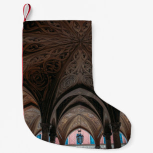 Brown and black wooden building interior small christmas stocking
