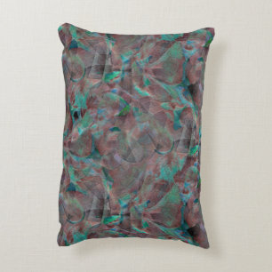 Brown and cyanish spots on unfinished wall plaster accent pillow