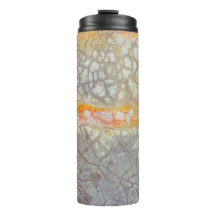 Brown and gray concrete surface thermal tumbler