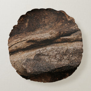 Brown and gray rock formation round pillow