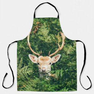 BROWN AND WHITE DEER SURROUNDED BY GREEN PLANTS APRON