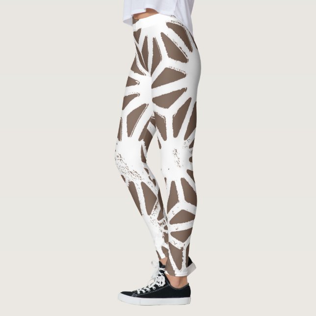 Brown and white geometric pattern leggings (Left)