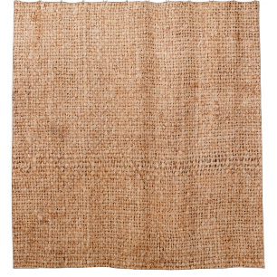 Brown burlap laying on white sheet. Abstract backg