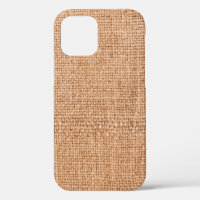 Brown burlap laying on white sheet. Abstract backg