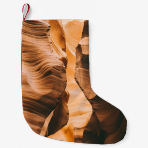 Brown cave under clear sky small christmas stocking