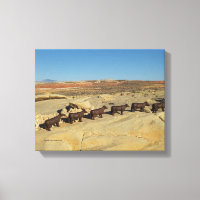 brown cows walking in desert