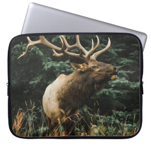BROWN DEER ON GREEN GRASS DURING DAYTIME LAPTOP SLEEVE