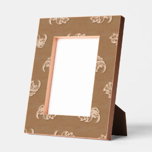 Brown floral-patterned card with an empty central etched frames