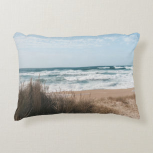 BROWN GRASS NEAR SEA UNDER BLUE SKY ACCENT PILLOW