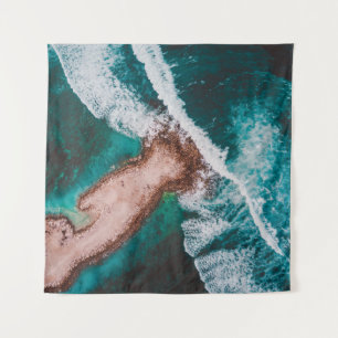 BROWN ISLAND SURROUNDED BY SEA WATER DURING DAYTIM TAPESTRY