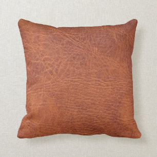 Brown leather throw pillow