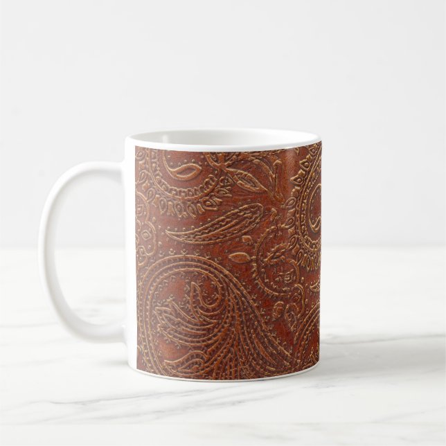 Brown leather, tooled floral pattern. coffee mug (Left)
