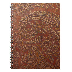 Brown leather, tooled floral pattern. notebook