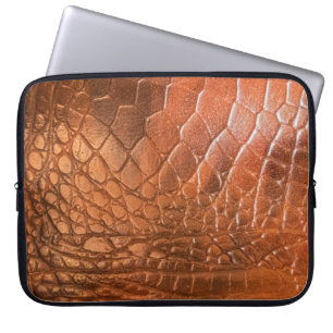 Brown leather with a pattern in the form of a scal laptop sleeve