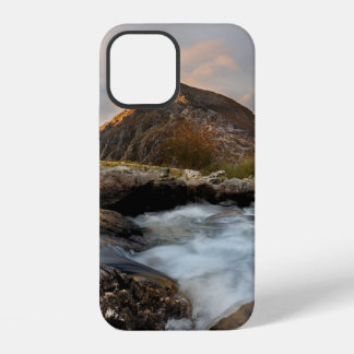 BROWN MOUNTAIN NEAR BODY OF WATER UNDER CLOUDY SKY iPhone 12 CASE