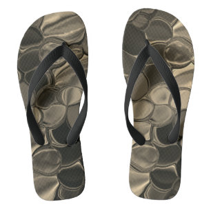 Brown pieces, circles and rounded off shapes flip flops