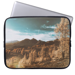 BROWN ROCKY MOUNTAIN UNDER BLUE SKY DURING DAYTIME LAPTOP SLEEVE