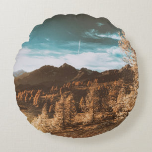 BROWN ROCKY MOUNTAIN UNDER BLUE SKY DURING DAYTIME ROUND PILLOW