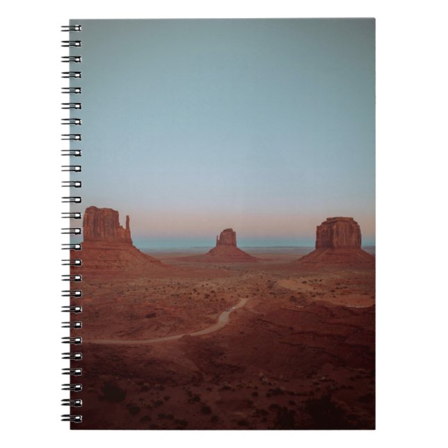 BROWN ROCKY MOUNTAINS AND FIELD DURING DAY NOTEBOOK (Front)