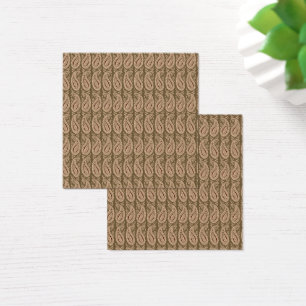 Brown rug featuring a detailed motif pattern with 