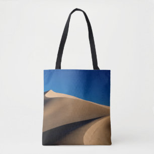 BROWN SAND UNDER BLUE SKY DURING DAYTIME TOTE BAG