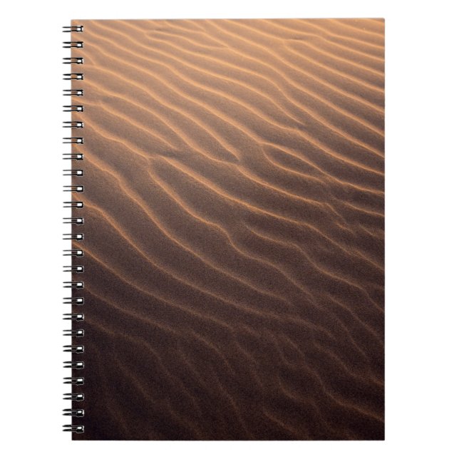 Brown sand with water in the morning notebook (Front)
