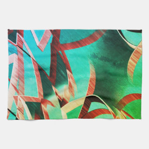 Brown streaks over rustic green and aquamarine kitchen towel
