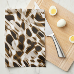 Brown twisting holes in motion, dark and whitish kitchen towel
